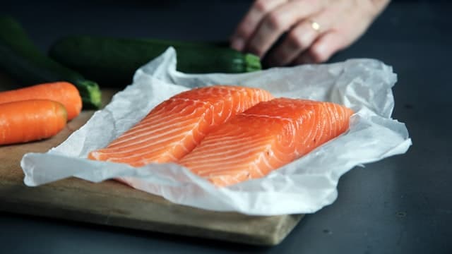 unwrapping raw salmon